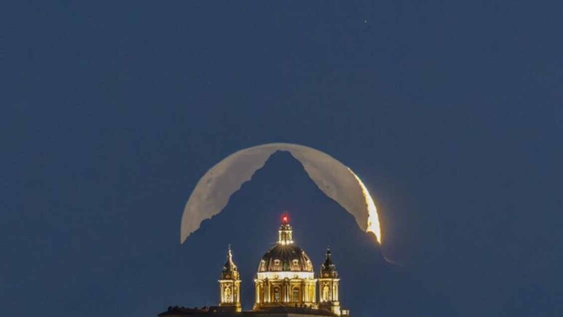 La foto destacada de Turín: la basílica de Superga, la montaña de Monviso y la luna. 