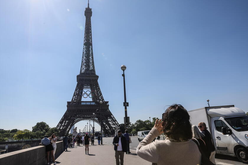 Olympic rings unveiled on the Eiffel Tower 50 days before Paris games