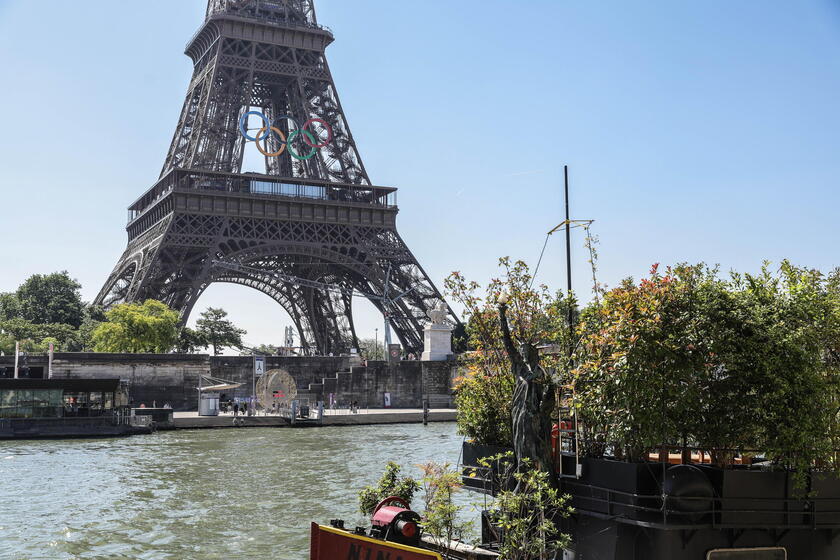 Olympic rings unveiled on the Eiffel Tower 50 days before Paris games