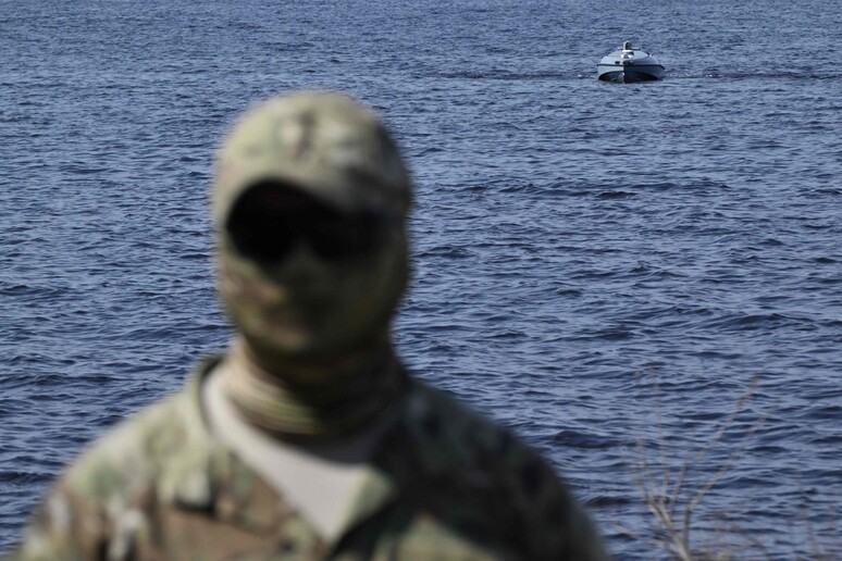 A Ukrainian serviceman stands near a Magura V5 © ANSA/AFP