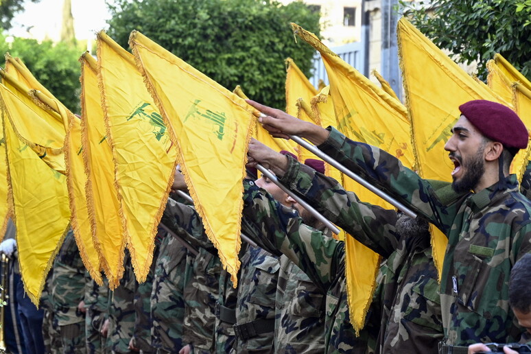 Hezbollah fighters © ANSA/EPA